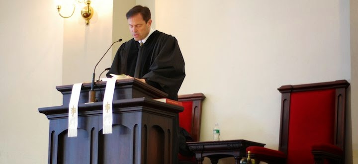 Image result for pastor in the church pulpit